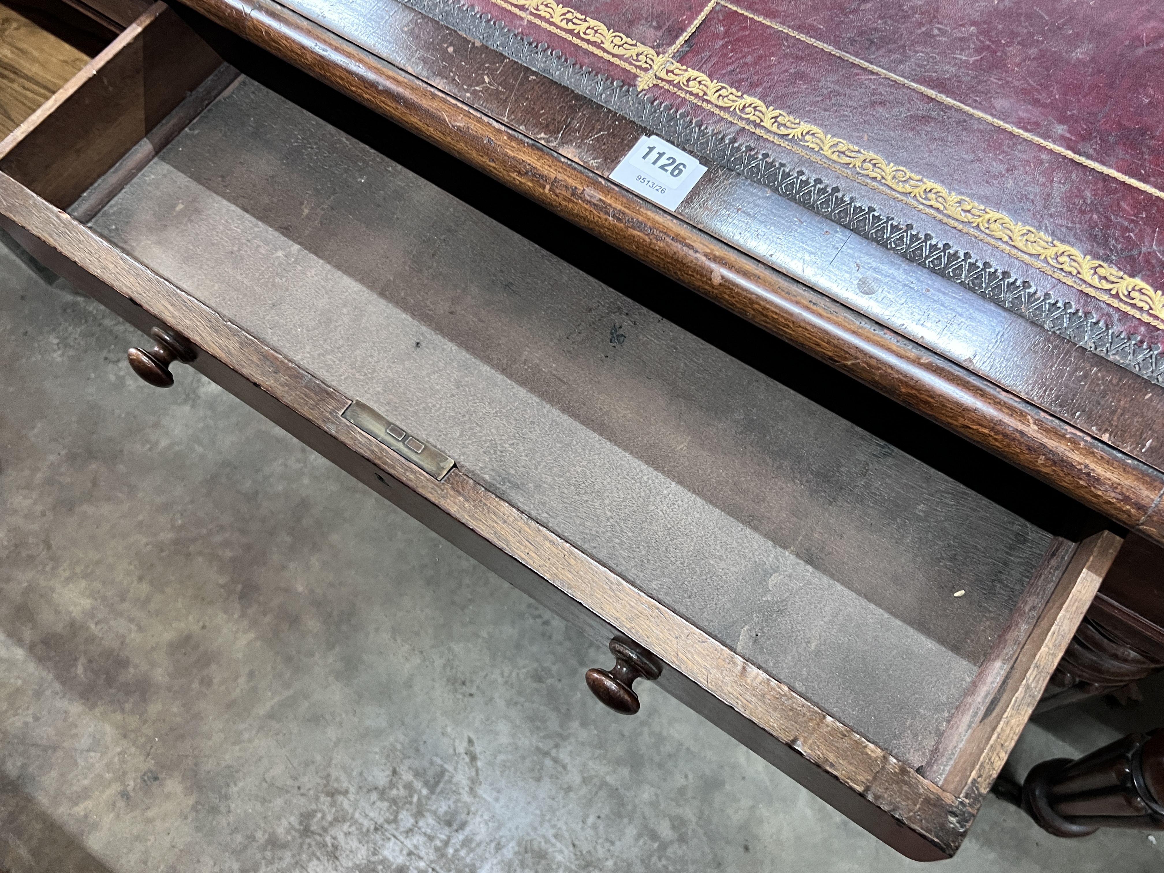 A mid Victorian mahogany partner’s writing table, width 156cm, depth 109cm, height 76cm